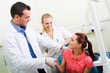 dentist congralating patient for successful operation