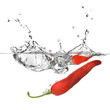 red pepper dropped into water with splash isolated on white