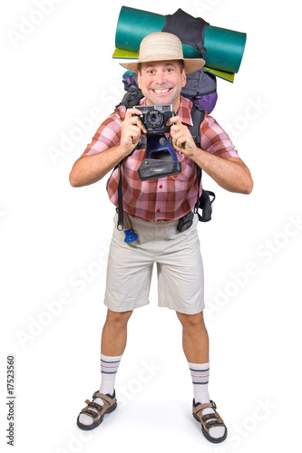 Photo: smiling tourist with camera smiling tourist with camera