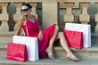 Beautiful Latin Woman In Red Dress With Shopping Bags Beautiful Latin Woman In Red Dress With Shopping Bags