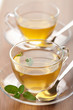 two cups of green tea with mint