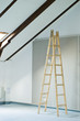 construction interior with stepladder and wall