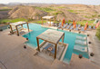 Photo: Luxury Pool Spa with Pergolas and view of a golf course Luxury Pool Spa with Pergolas and view of a golf course