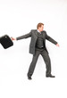 A businessman throwing a briefcase
