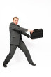 Young businessman protecting important and precious briefcase.