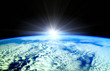 Sun beams over Earth horizon Sun beams over Earth horizon