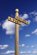 Wooden signpost for future and past