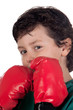 Funny boy with boxing gloves