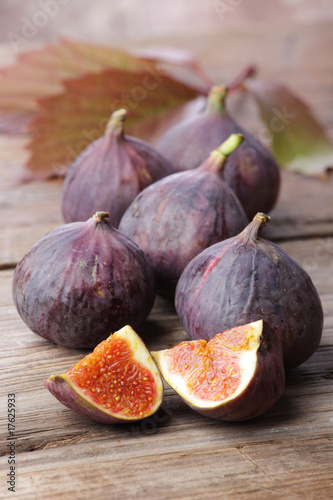 Photo: Figs on wooden rustic background Figs on wooden rustic background