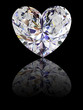 Heart shape diamond on glossy black background Heart shape diamond on glossy black background