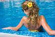 Blonde girl in swimming pool