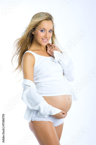 Photo: Pregnant woman in white shirt Pregnant woman in white shirt
