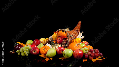 Photo: Fall arrangement of fruits and vegetables in a cornucopia Fall arrangement of fruits and vegetables in a cornucopia