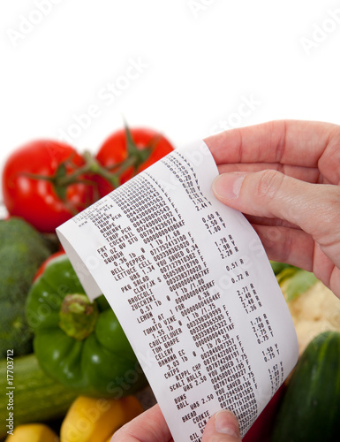 Photo: Grocery List over a bag a vegetables Grocery List over a bag a vegetables
