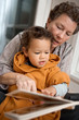 Grandmother Reading with Grandson