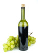 Bottle with red wine and green grapes near Bottle with red wine and green grapes near