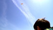 Video: Boy playing with kite over blue sky Boy playing with kite over blue sky