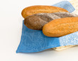 Breadbasket with bread on a white background