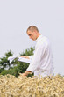 Scientist or student in the field taking notes about experiment