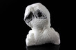 Sad lonely white ghost on black background
