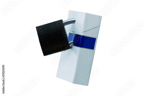 Photo: Pack of cigarettes on the lock isolated on white Pack of cigarettes on the lock isolated on white