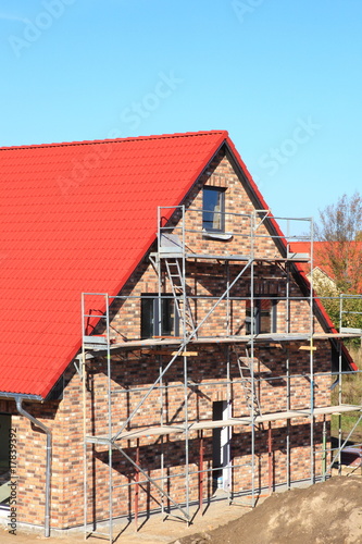 Photo: Neubau Einfamilienhaus Dachstuhl Rohbau blauer Himmel Neubau Einfamilienhaus Dachstuhl Rohbau blauer Himmel
