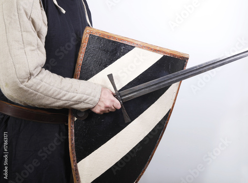 Photo: Medieval soldier with sword and shield Medieval soldier with sword and shield