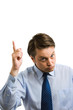 Businessman pointing up