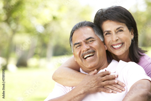 Photo: Portrait Of Senior Couple In Park Portrait Of Senior Couple In Park