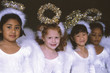 Girls in angel costumes smiling