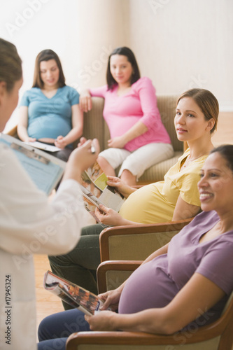 Photo: Group of pregnant women in waiting room Group of pregnant women in waiting room