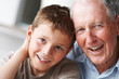 Closeup portrait of a happy senior man with grandson