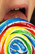 Licking lollypop