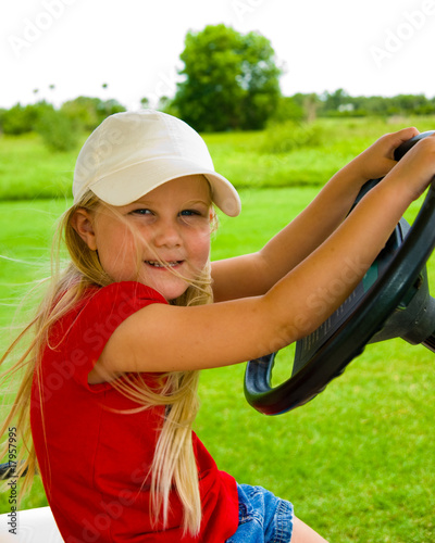 Photo: little girl - big wheel little girl - big wheel