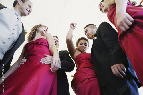 Photo: Low angle view of multi-ethnic bridal party Low angle view of multi-ethnic bridal party