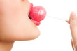 Cute woman with bright candy