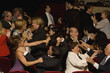 Hispanic people fighting in theatre