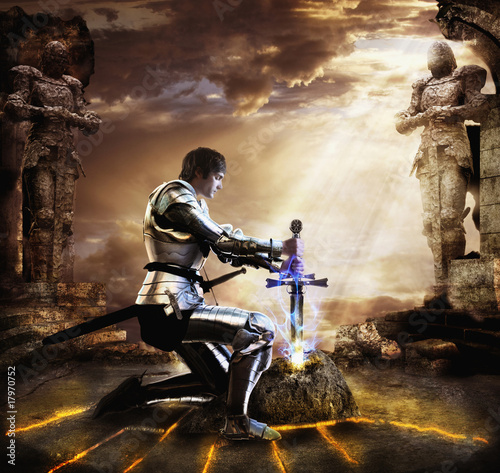 Foto: Knight pulling sword from stone Knight pulling sword from stone