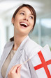 Lovely woman smiling with an English flag