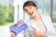 Photo: Happy lovely woman with an Australian flag Happy lovely woman with an Australian flag