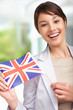 Beautiful young female with Great Britain's flag