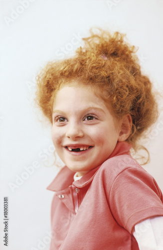 Photo: Girl (8-9 smiling, portrait Girl (8-9 smiling, portrait