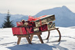 Sleigh with presents in snowy landscape