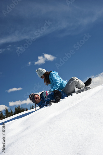Photo: Couple playing with snow Couple playing with snow