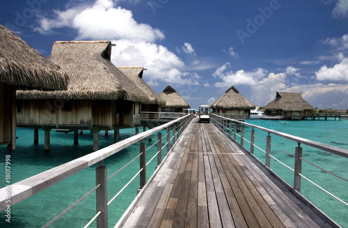 Photo: overwater bungalows at tropic lagoon in Bora-Bora overwater bungalows at tropic lagoon in Bora-Bora
