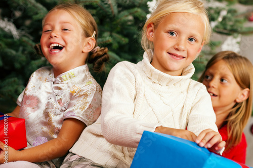 Photo: Christmas - Children with presents Christmas - Children with presents