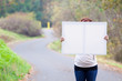 Holding White Sign Holding White Sign