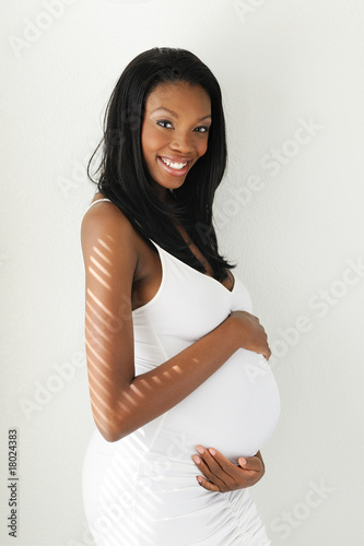 Photo: Pregnant woman holding her belly Pregnant woman holding her belly