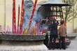 Candles and praying women Candles and praying women