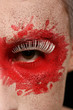 a man with colored painted face